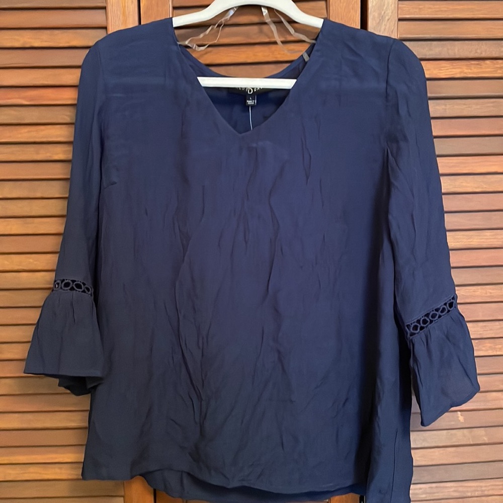 Dark blue ladies shirt. Fred David brand.
